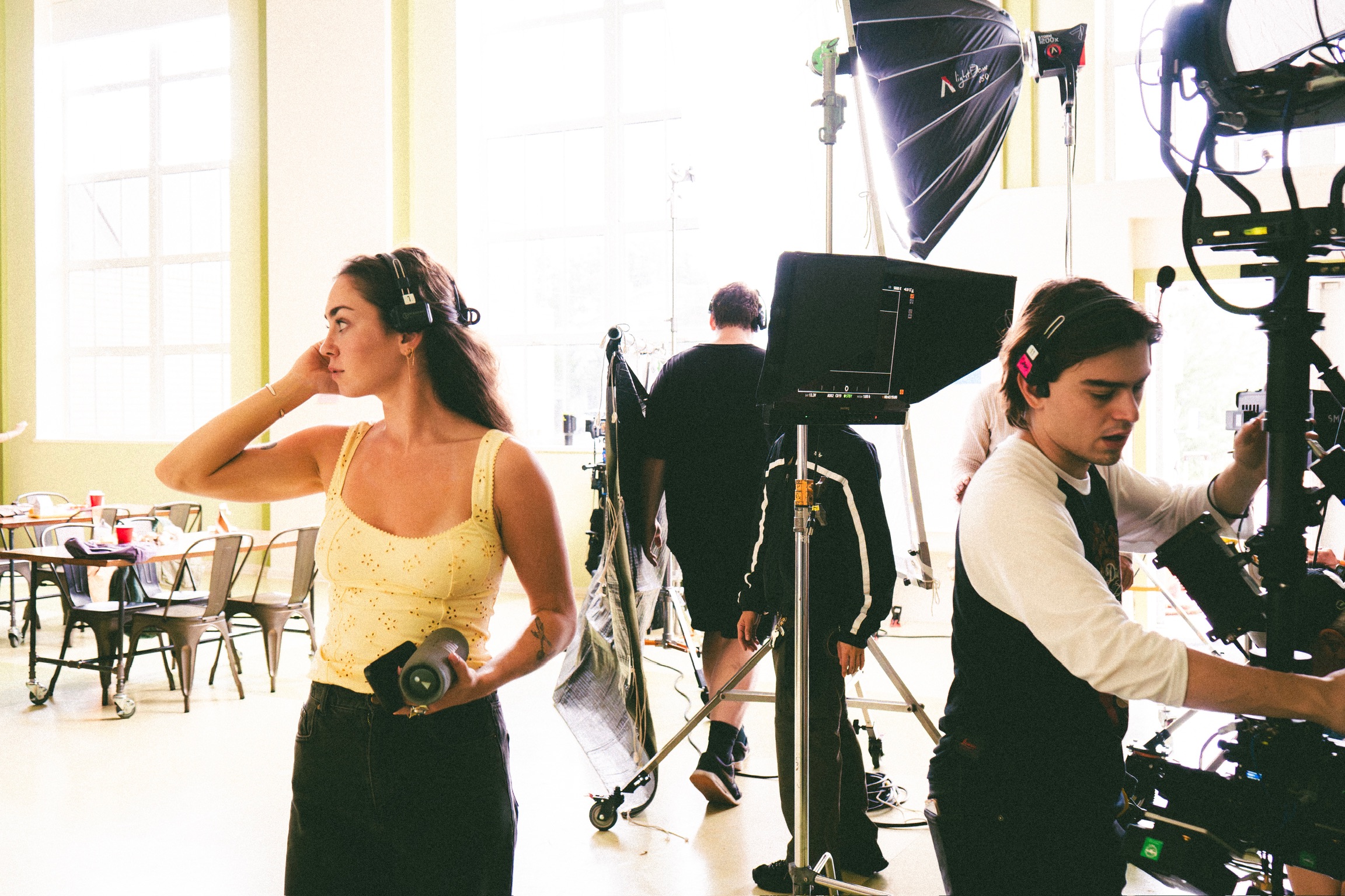Ella on set with the camera crew